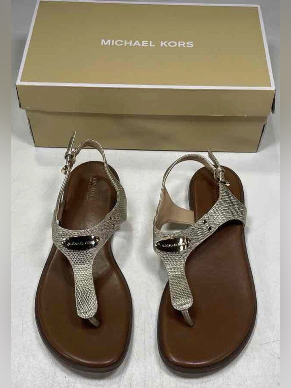 Michael Kors Plate Thong in Pale Bold - Sz. 10. Light wear.
